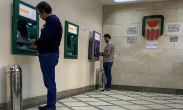 البنك الأهلى يرفع حدود الإيداع لبطاقات الخصم المباشر عبر ماكينات ATM